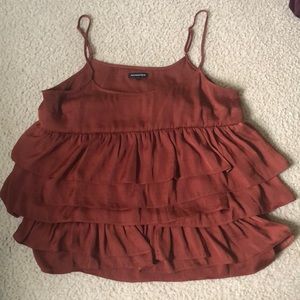 Rust colored ruffled tank top